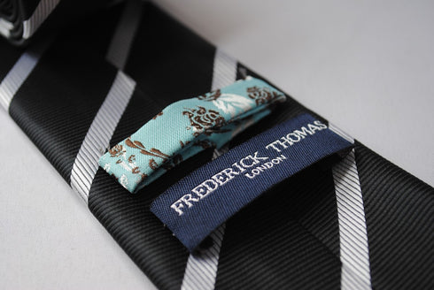 black tie with white stripes